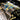 Detail der 3D Edelstahlstruktur „Rolex – Cash Rules“ von Devin Miles